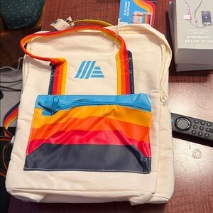 Stylish Cream Backpack with Rainbow Accents
